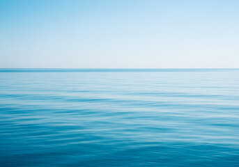 Obraz premium Tranquil Blue Ocean Horizon under Clear Sky