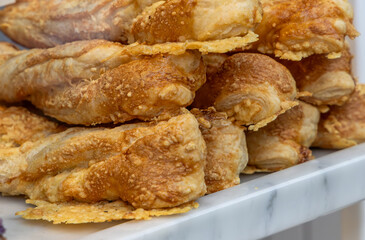 Close up image of West country cheese straws in a bakery in Harrogate, North Yorkshire, UK.
