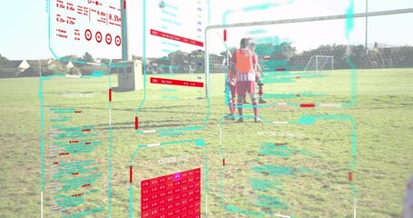 Player pausing to analyze holographic overlay and striking free kick during technology training - Powered by Adobe
