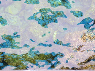 Naklejka premium Rock formations in the sea with ocean waves and natural coastal scenery.