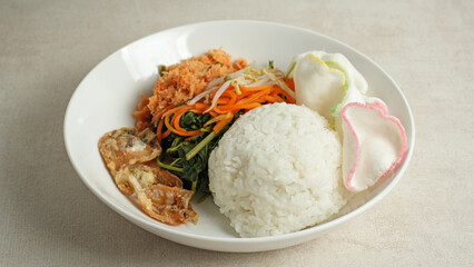Nasi Gudangan, rice served with various vegetable with grated coconut