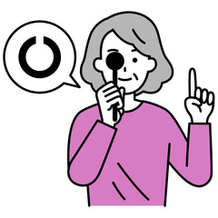 視力検査をする年配の女性