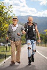 Full length portrait of two men walking in a park