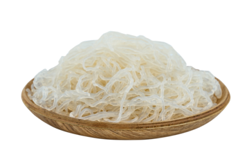 closeup Korean glass noodle vermicelli for Japchae food cutout in wood bowl