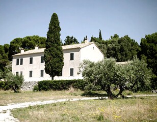 Rural farmhouse in sunny landscape