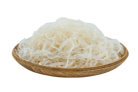 closeup Korean glass noodle vermicelli for Japchae food cutout in wood bowl