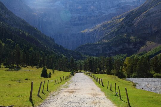 French Pyrenees landscape. Hiking trail in Cirque de Gavarnie mountain valley in Pyrenees National Park (French: Parc national des Pyrenees).