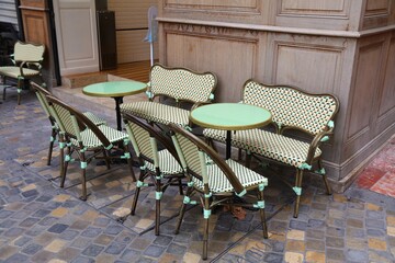 Narbonne, France. Sidewalk cafe tables in an Old Town alley.