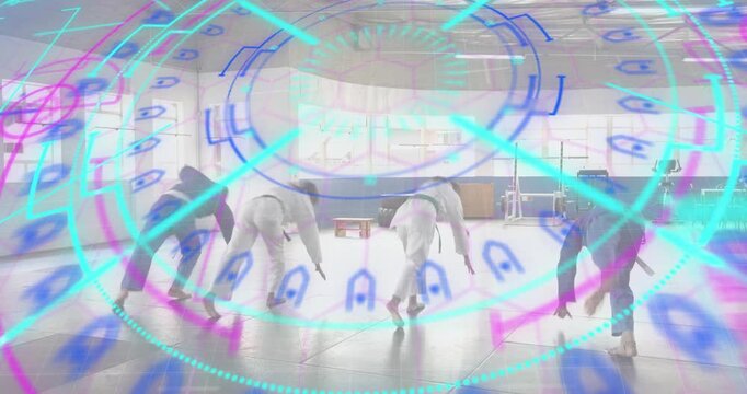 Holographic grid appearing over four martial artists crawling during training into stance