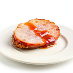 Honey glazed ham Sliced cooked ham with barbecue sauce on a white plate  
