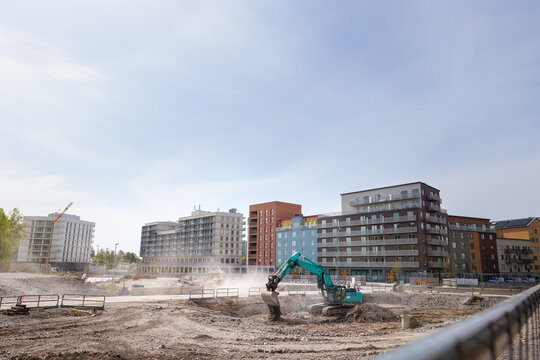 View of bulldozer working at construction site in city