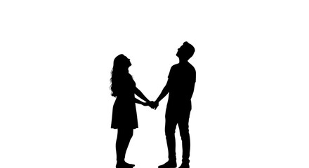 Silhouetted couple holding hands and looking up at the sky against a bright white background