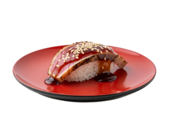 Teriyaki tuna sushi piece, glistening with sauce, sits on a rich red plate against a black background.
