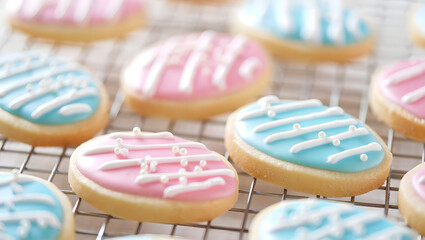 Fototapeta premium Closeup of easter cookies with pastel icing and sprinkles, showcasing their intricate decorations and festive colors, perfect for a holiday treat
