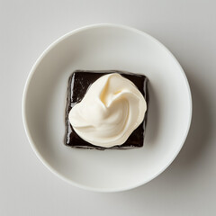 Traditional mammi dessert with whipped cream in minimal white bowl