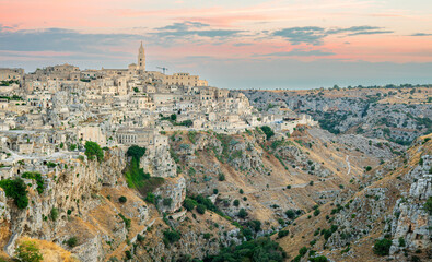 Fototapeta premium Sunrise over Matera’s Stone Cityscape 