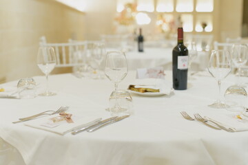 Table Set with Wine Bottle in Cozy Atmosphere.