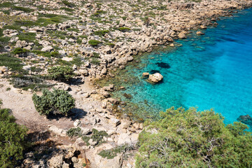 Rocky coastline and turquoise sea in Crete