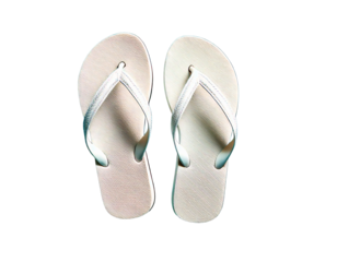 Pair of white flip flops with decorative straps on a teal background