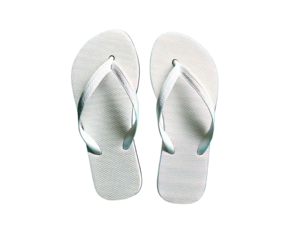 Pair of white flip flops with decorative straps on a teal background