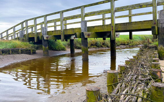 Wooden bridge over crick