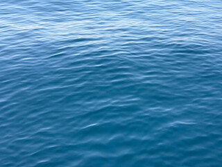 Ocean blue tranquil ripples water.