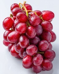 Fototapeta premium Fresh red grapes close up studio shot on white background healthy eating fruit food photography