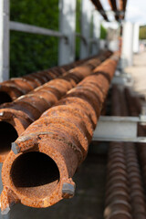 Rusty Drill Pipes in Industrial Storage