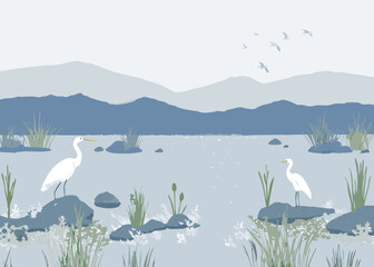 Two elegant white egrets stand on rocks in a serene wetland landscape with distant mountains and flying birds