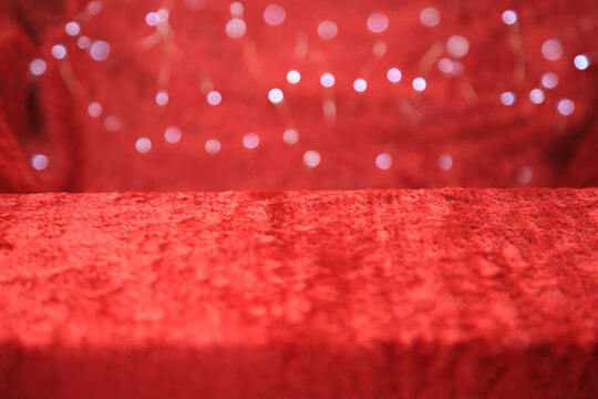 Bokeh von velvet red. background for displaying objects. red velvet christmas background.