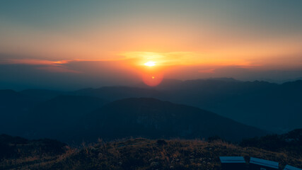 Serene mountain sunset with glowing horizon great for nature and landscape photography