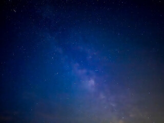 Naklejka premium Starry night sky with vibrant galaxy and stars ideal for astronomy and science photography