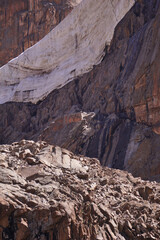 big glacier on red rocks