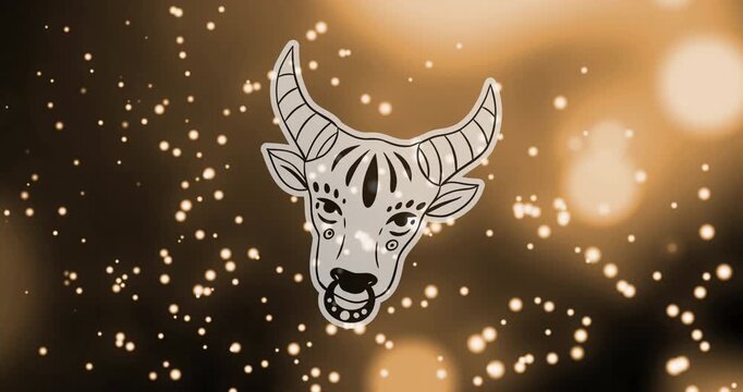 Animation of bull of taurus zodiac sign against illuminated floating particles and lens flare