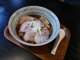 Delicious Ramen Bowl with Tender Chashu and Green Onions