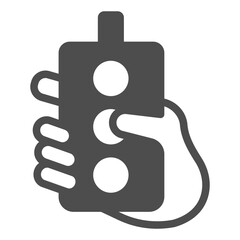 Wired remote with buttons in hand solid icon, manufacturing concept, factory control process sign on white background, glyph style icon for mobile and web design. Vector graphics.