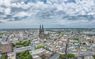 Panorama View of Hohenzollern Bridge, Cathedral in Cologne City, Germany. Drone