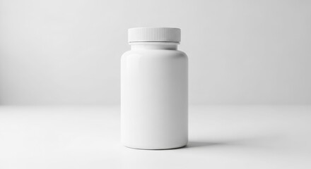 A white plastic bottle with a screw-on cap stands on a white surface against a white background.