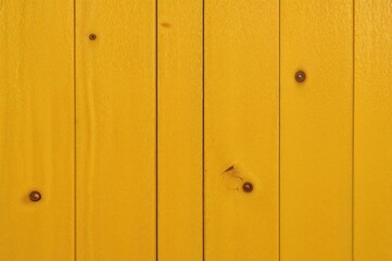 Yellow wooden door's texture