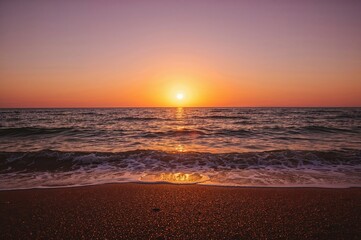 Sunset over the ocean horizon