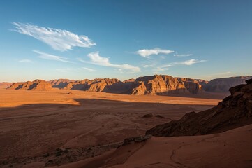 Fototapeta premium The crimson sands of a vast desert landscape
