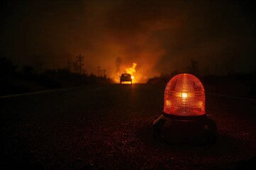 The beacon shown is orange in color. Fire safety exercise with conditions applied.