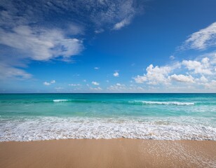 Obraz premium a serene beach scene captures the beauty of nature with vivid blue skies fluffy clouds and gentle waves inviting relaxation and peace at a coastal retreat