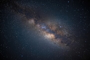 Fototapeta premium Night sky filled with stars, the Milky Way, and far-off galaxies