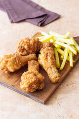 Chicken legs fries and french fries. Fast food. American cuisine.