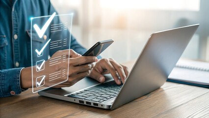 Businessman using a mobile phone and laptop to manage checklist tasks, ensuring compliance and quality control in online work for successful project completion and goal achievement