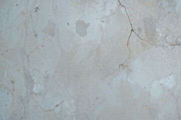 Surface of concrete covered with dull blue paint texture