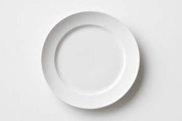 Simple white dish set against a white background
