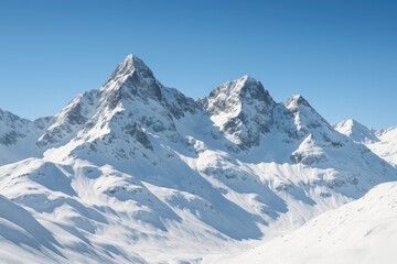 Chilly winter scene with frosty mountain tops and a bright blue sky