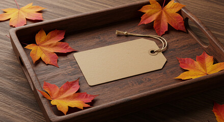 Warm autumn leaves surround a blank kraft paper tag on a rustic wooden tray, perfect for seasonal promotions